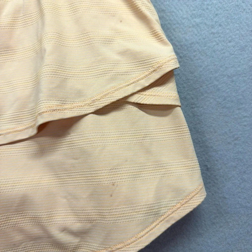 Athleta Girl Swing Mini Skort XL/14 Light Peach Golf Tennis Performance Ruffled